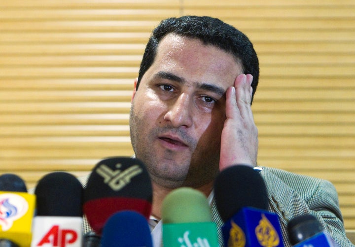 Iranian scientist Shahram Amiri speaks to journalists as he arrives at the Imam Khomini Airport in Tehran, July 15, 2010.