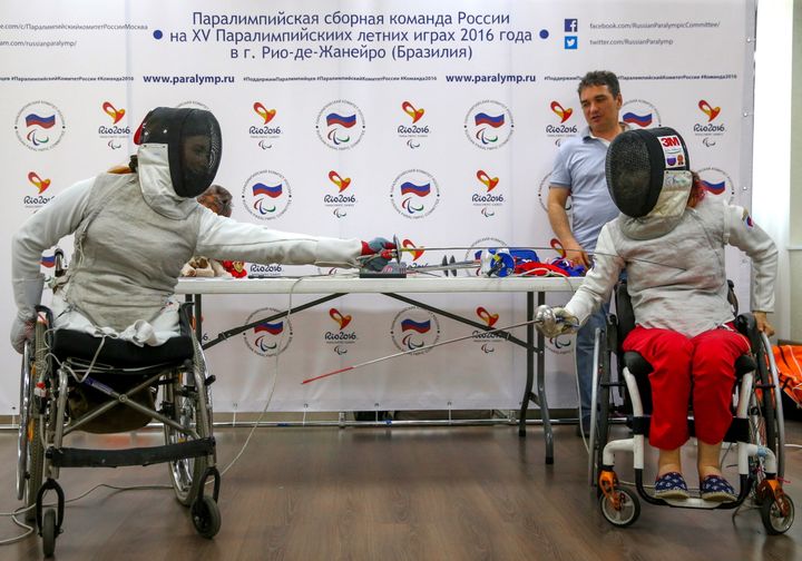 Anna Petukhova (L) and Kseniya Ovsyannikov, members of the Russian wheelchair fencing team, at a press conference on the 2016 Summer Paralympic Games.