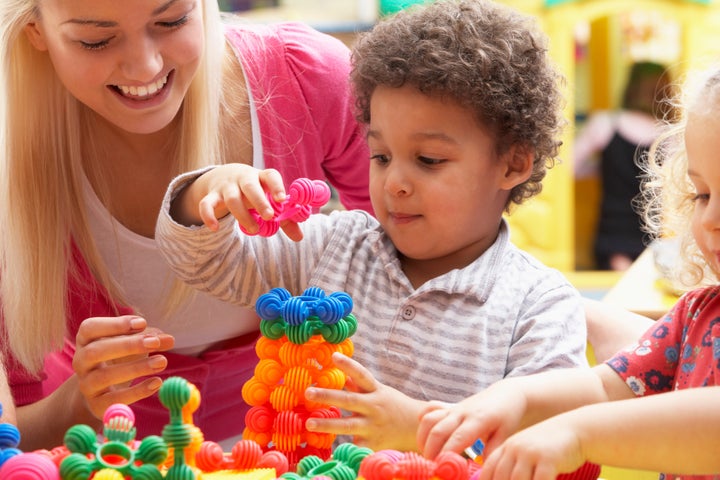 OT and child playing together