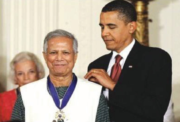 President Obama places a 2009 Presidential Medal of Freedom around the neck of Yunus at the White House on Aug 12, 2009. To address the poverty of rural villages, Obama's mother, Dr. Ann Duham created microcredit programs in Indonesia. 