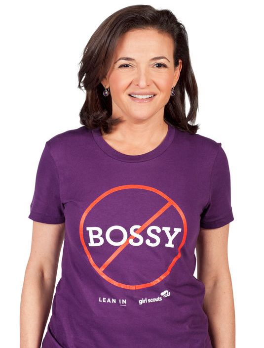 Sandberg, wearing a shirt from her Ban Bossy campaign in conjunction with her Lean In Foundation and the Girl Scouts of America