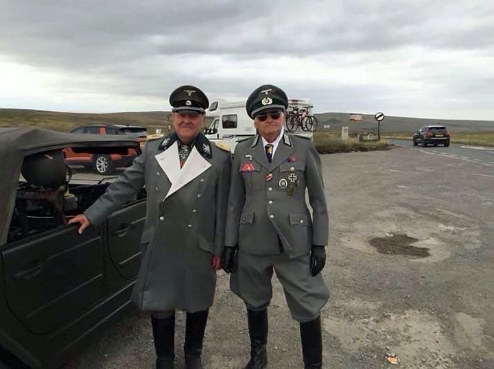 Greater Manchester Police's traffic unit has been forced to delete an 'offensive' tweet of two men dressed in Nazi uniform.