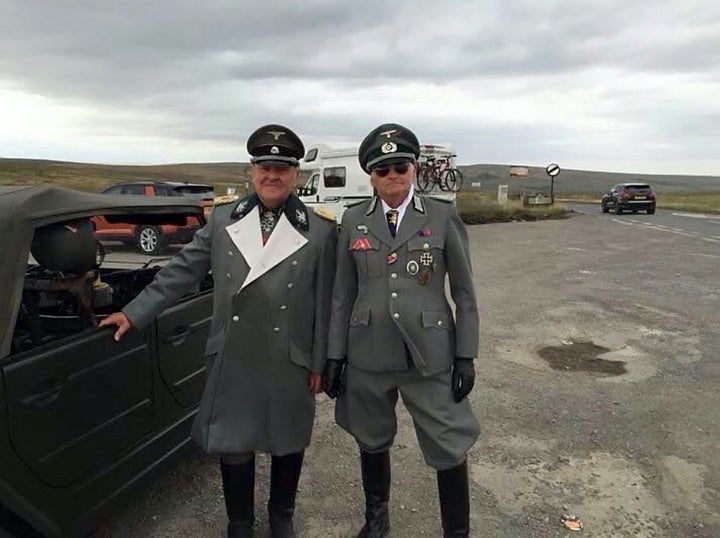 <strong>Greater Manchester Police's traffic unit has been forced to delete an 'offensive' tweet of two men dressed in Nazi uniform.</strong>