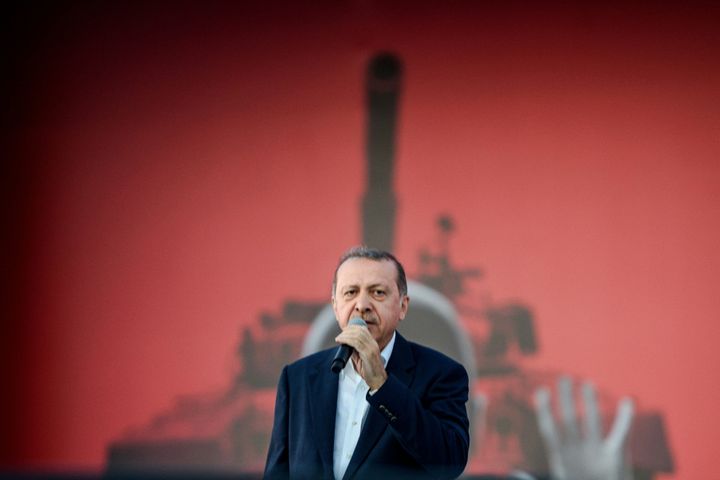 Turkish President Recep Tayyip Erdogan speaks on August 7, 2016 in Istanbul during a rally against the failed military coup on July 15.