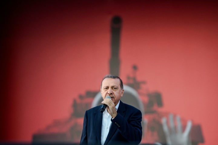 Turkish President Recep Tayyip Erdogan speaks on August 7, 2016 in Istanbul during a rally against the failed military coup o