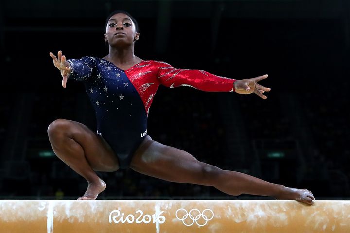Simone Biles competes on the balance beam during women's qualification for artistic gymnastics on Day 2 of the Rio 2016 Olympic Games.