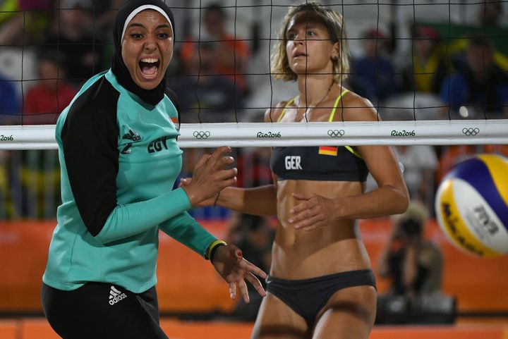 Egypt's Doaa Elghobashy, left, and Germany's Laura Ludwig, right. Two great athletes, two very different beach volleyball outfits.