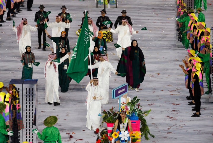 Flagbearer Sulaiman Hamad (KSA) of Saudi Arabia leads his contingent during the opening ceremony.