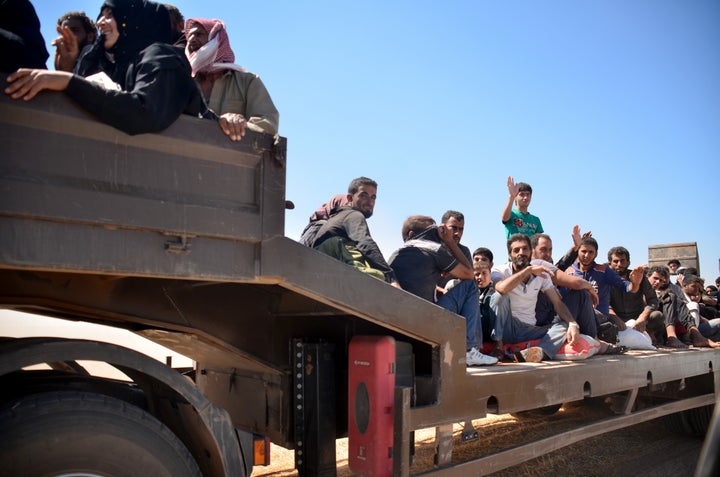 Civilians flee from ISIS-controlled territories due to clashes in Aleppo, Syria on July 4, 2016.