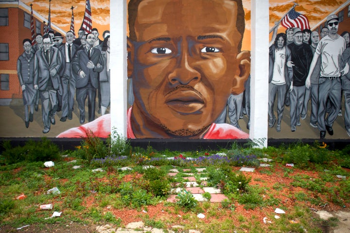 A mural in Baltimore depicts Freddie Gray, who died in custody of Baltimore Police officers following a "rough ride" in a police van. 