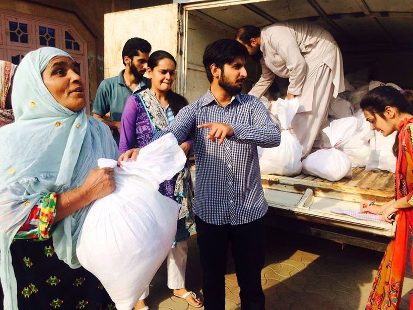 Wheat and rice bags being distributed in Lahore, Pakistan