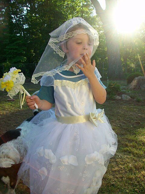 Our youngest, gender creative son, in 2009, wearing one of his many princess dress-up costumes