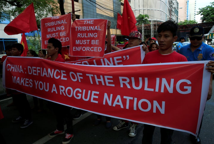 Activists protest over the South China Sea disputes in front of a Chinese consulate in Manila.