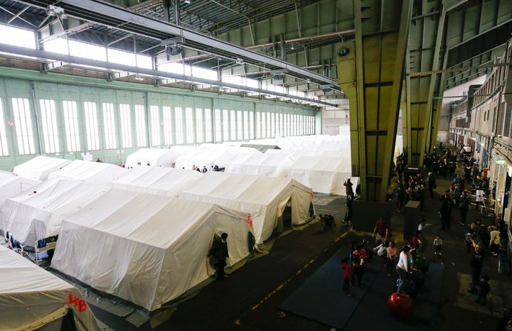 A general view of tents at a shelter for migrants inside a hangar of another centre at the former Tempelhof airport in Berlin