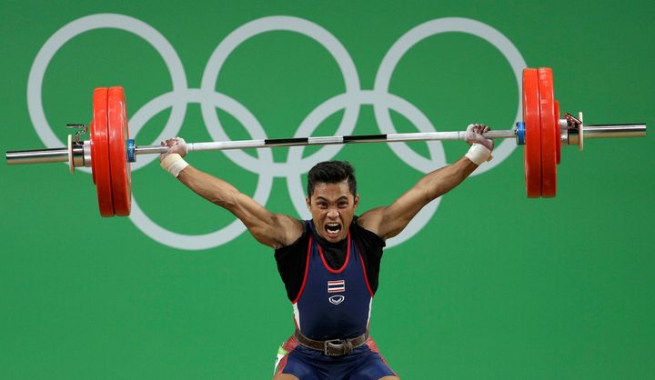 Sinphet Kruithong of Thailand competing in the 56kg weightlifting category 