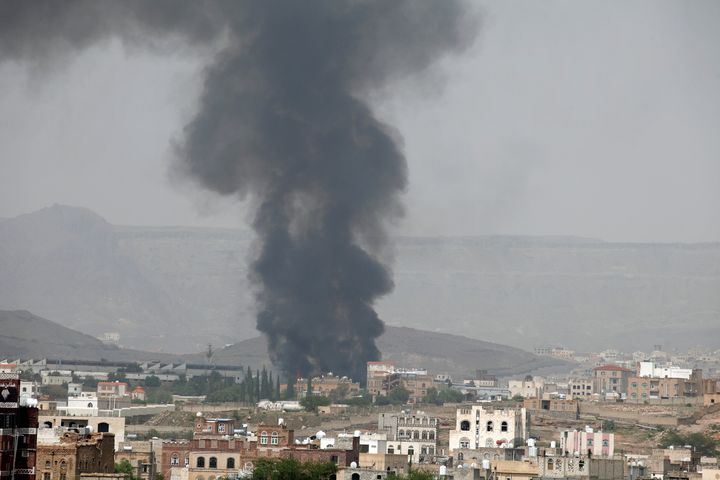 Smoke rises from a snack food factory after a Saudi-led air strike hit it in Sanaa, Yemen, on Tuesday.