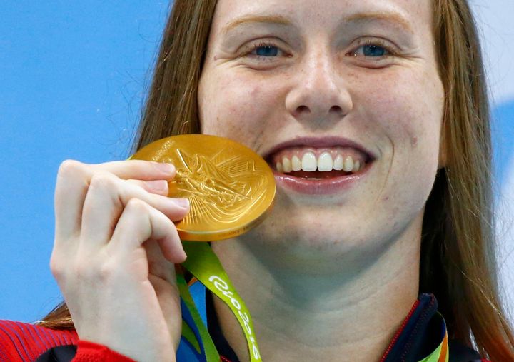 Lilly King celebrates her gold medal victory.