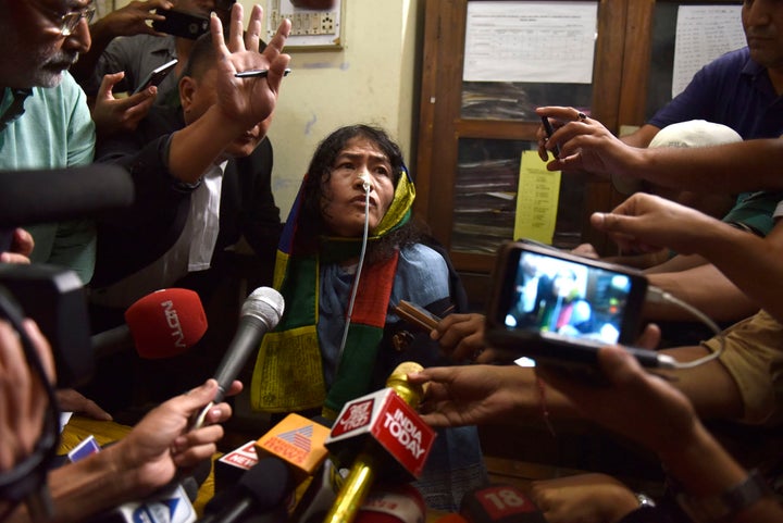 Human rights activist Irom Sharmila addressing press as she was brought to the Cheirap court on August 9.