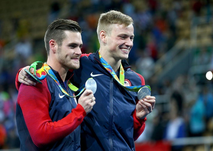 Silver medalists David Boudia (L) & Steele Johnson (R) of USA pose with their Olympic medals, Aug. 8, 2016.