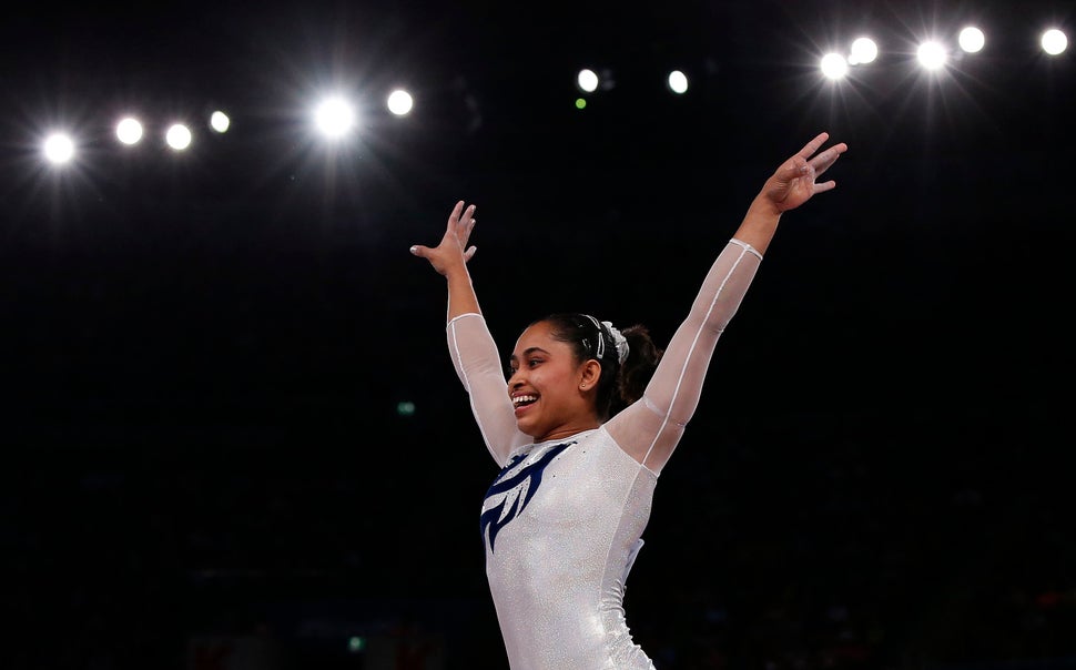 Dipa Karmakar reacts after a successful vault during the women’s gymnastics vault apparatus final at the 2014 Commonwea