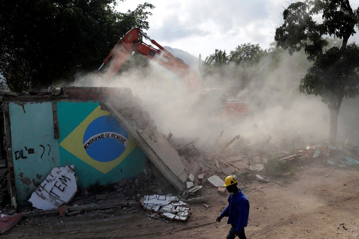 One of the last remaining homes in Vila Autódromo, a favela near Rio's Olympic Village, is demolished on Aug. 2.