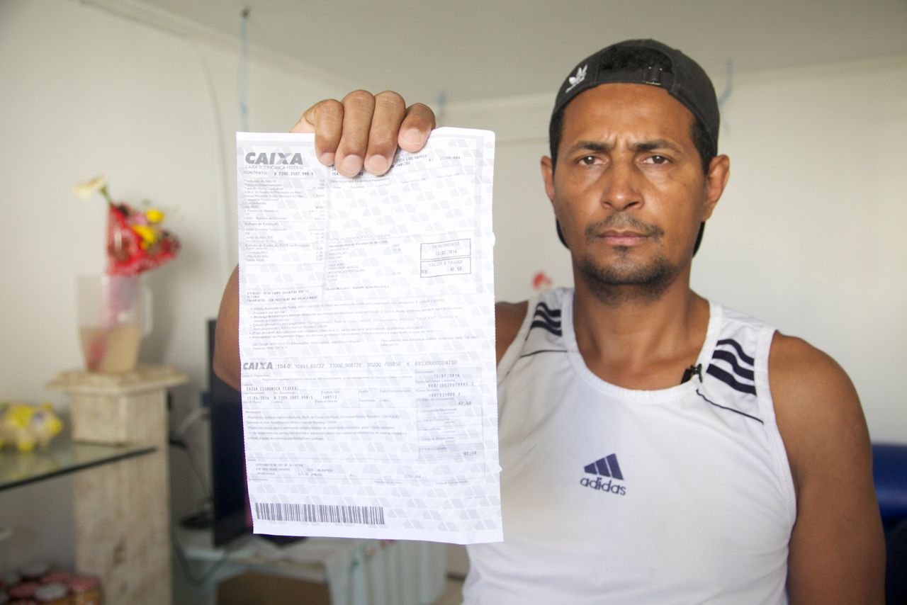 Iran Souza was relocated to new housing after his home in Autódromo was demolished, but he's not happy. "Most families regret living here," he said.