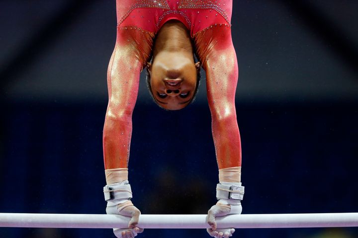 Gabby Douglas warms up on the uneven bars during the U.S. women's gymnastics championships, in June 2016, in St. Louis. 