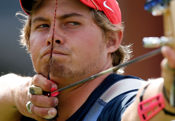 Brady Ellison of the U.S. takes aim during the men's archery team quarterfinals at the Lords Cricket Ground during the London 2012 Olympics.
