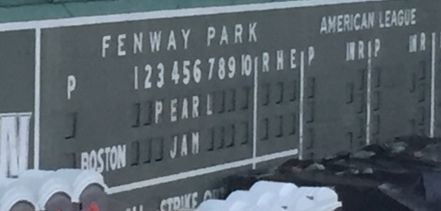 Pearl Jam's name embedded in the Green Monster scoreboard at Fenway.