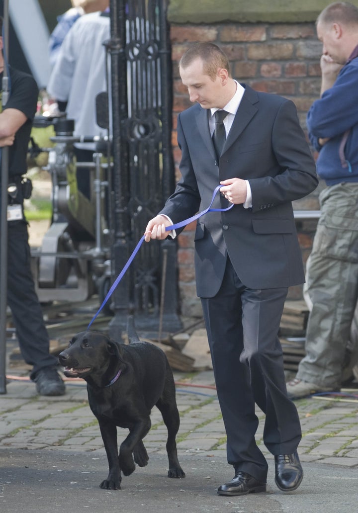 <strong>Kirk, played by Andy Whyment with Ozzy, at Liam's funeral</strong>