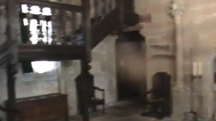 <strong>Ghost hunter Mark Vernon claims the spectre followed him around the hall after making contact downstairs</strong>