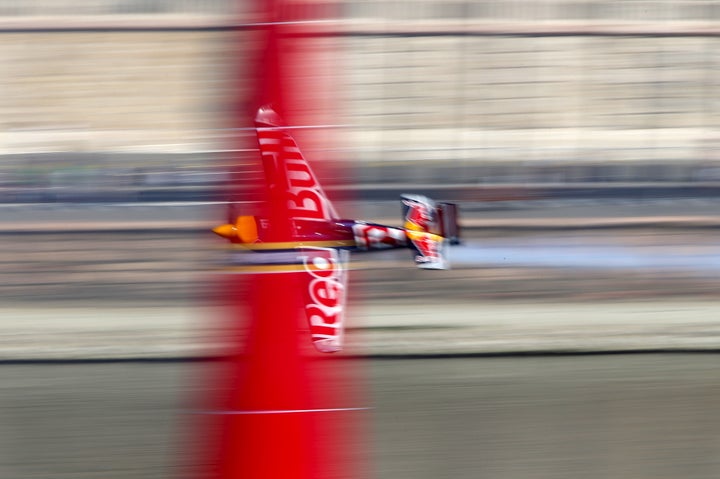 <strong>Hungary pilot Peter Besenyei flies his Edge 540 V3 aircraft during the qualifying session of the Red Bull Air Race World Championship in Budapest, Hungary, July 4, 2015</strong>