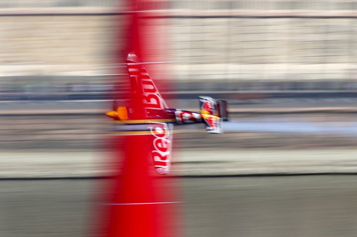 Hungary pilot Peter Besenyei flies his Edge 540 V3 aircraft during the qualifying session of the Red Bull Air Race World Championship in Budapest, Hungary, July 4, 2015