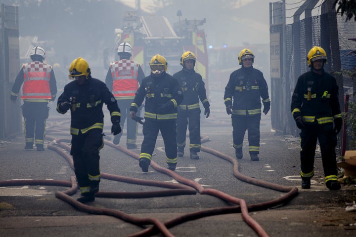 Firefighters try to extinguish the fire at London's Studio 338 nightclub in North Greenwich.