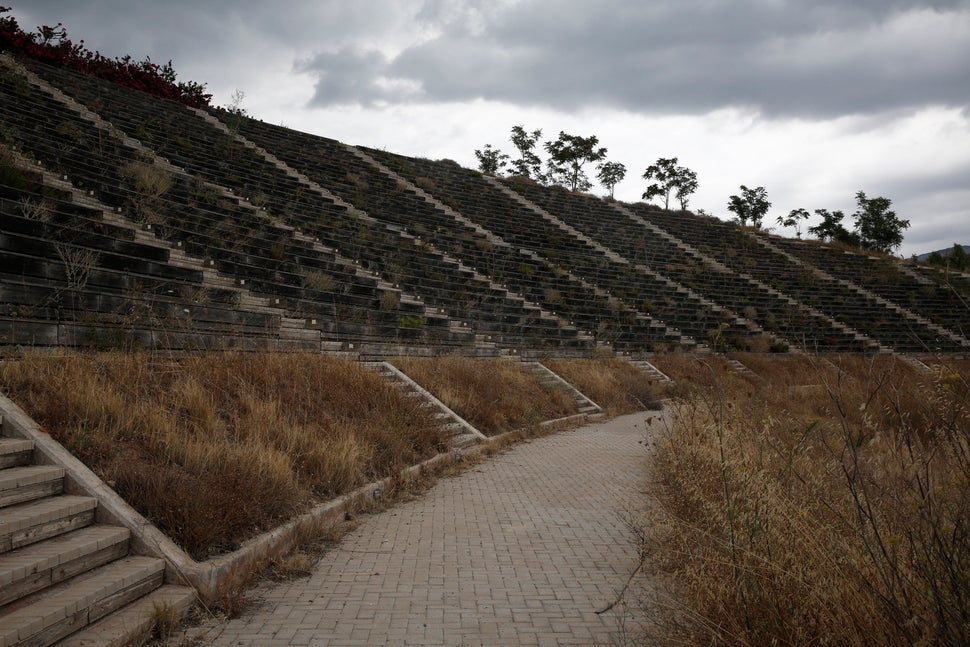 The stands are seen at the abandoned Olympic Canoe and Kayak Slalom Centre at the Hellenikon complex in Athens, July 2014.