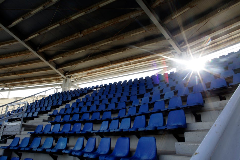 An empty stadium seating stand is seen at the abandoned Olympic baseball field at the former Athens International Airport in 