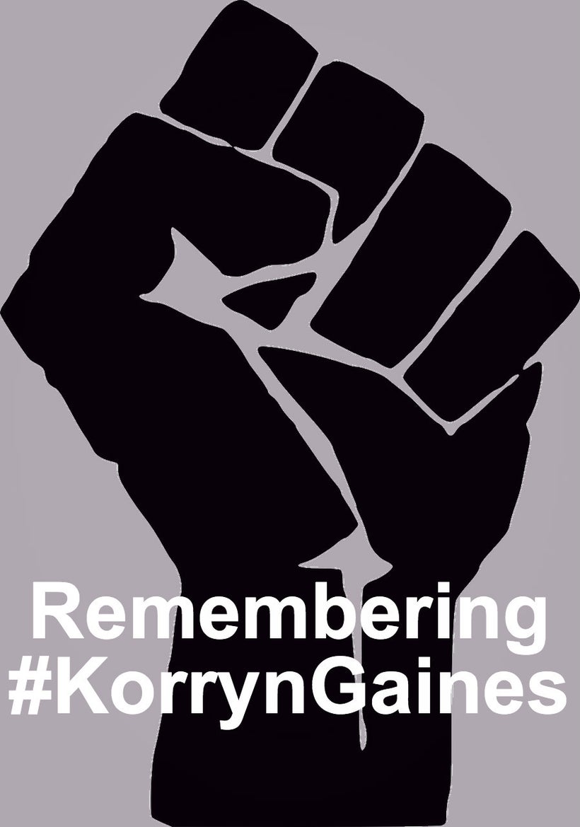 Black fist graphic against a muted purple-gray background. Wording on the wrist of the hand reads in bold white font: &