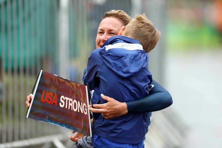 Armstrong celebrates with her son Lucas.