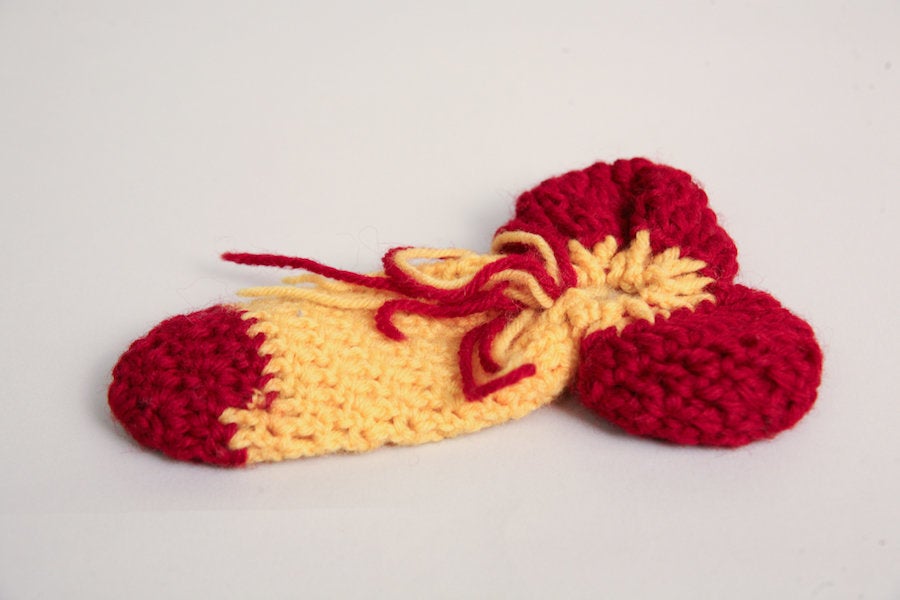 Anonymous, "Penis Warmers," 20th century, fabric and yarn.