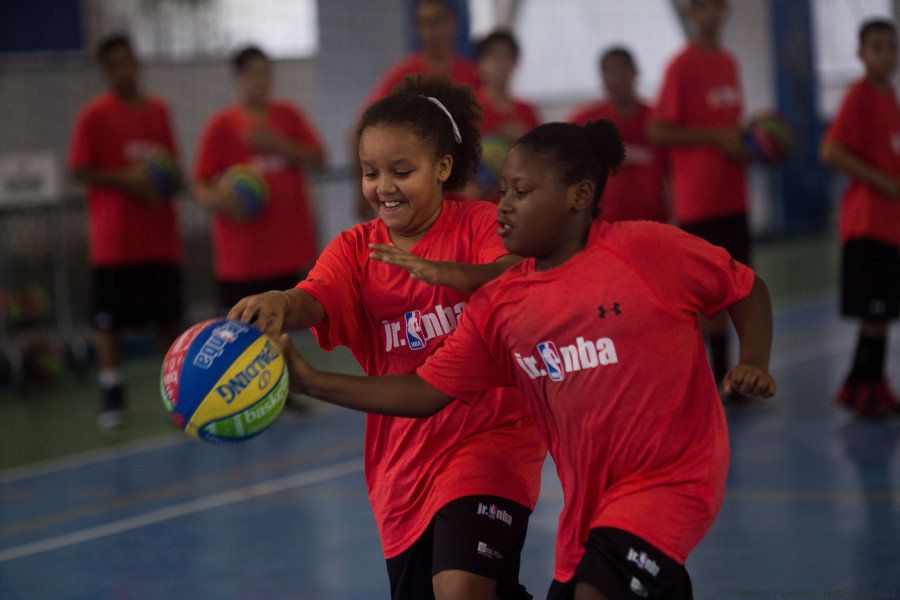 Ashley, left, is one of the most enthusiastic basketball players at Rocinha's newly renovated sports complex.
