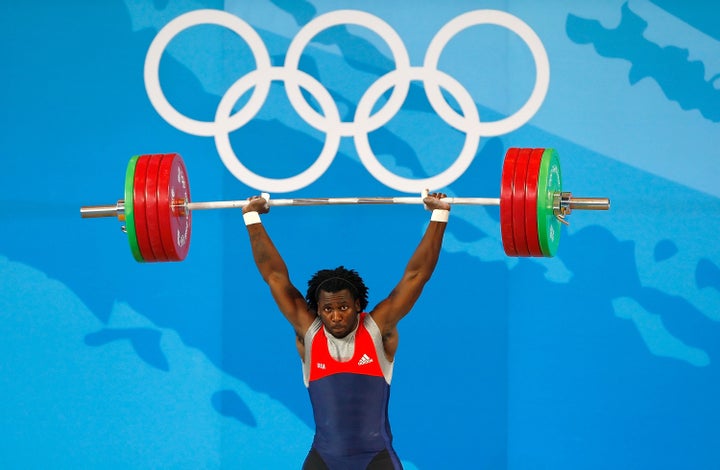 Kendrick Farris of the United States competes in the 85kg weightlifting event at the Beijing University of Aeronautics & Astronautics Gymnasium on Day 7 of the Beijing 2008 Olympic Games in Beijing, China.