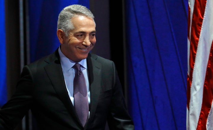 Former Reagan Administration official Doug Elmets walks off stage after addressing the Democratic National Convention in