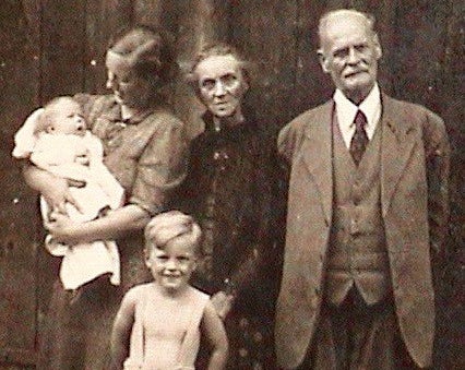 My father, with mom, grandparents, and infant sister 