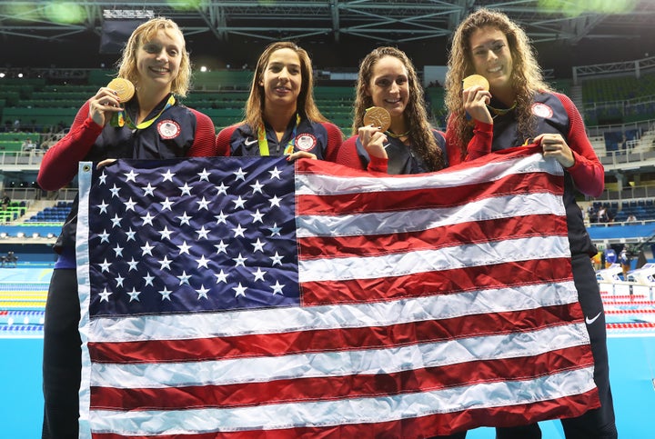 Katie Ledecky, Maya Dirado, Leah Smith and Allison Schimdt of United Statesvpose with their Gold medals from the Women's 4 x 20m Freestyle Relay on Day 5 of the Rio 2016 Olympic Games