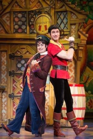 Matt DaSilvla (LeFou) and Christiaan Smith-Kotlarek <br>(Gaston) in a scene from <strong><i>Beauty and the Beast</i></st