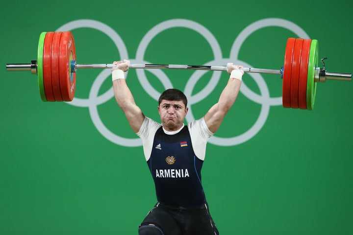 Armenian weightlifter Andranik Karapetyan was in contention for a medal before his elbow gave way.