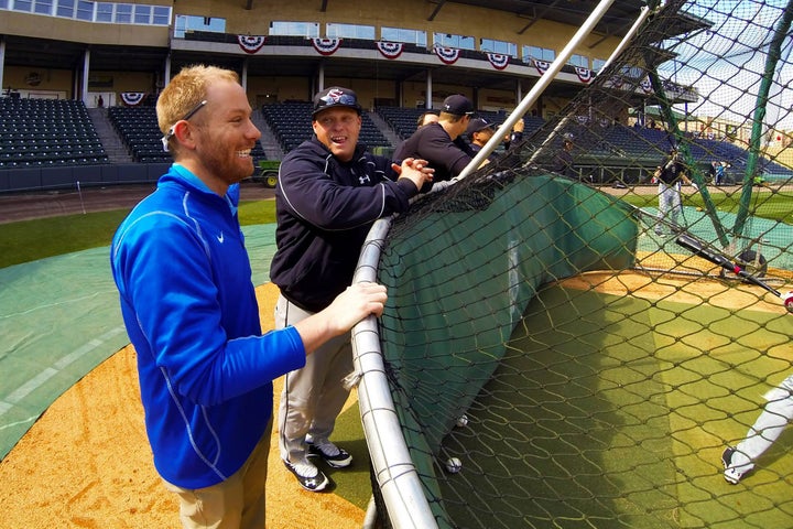 Eric Jarinko preps the field before the day's game.