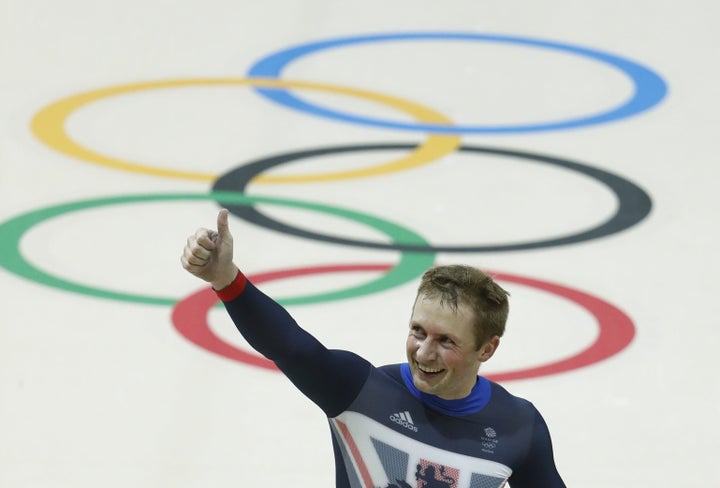 Britain's Jason Kenny gives a thumbs up as he celebrates after winning gold in the men's Team Sprint track cycling finals at the Velodrome during the Rio 2016 Olympic Games in Rio de Janeiro.