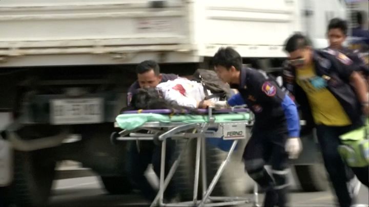 <strong>Thai rescue workers attend to an injured victim after a bomb exploded in Hua Hin, south of Bangkok</strong>
