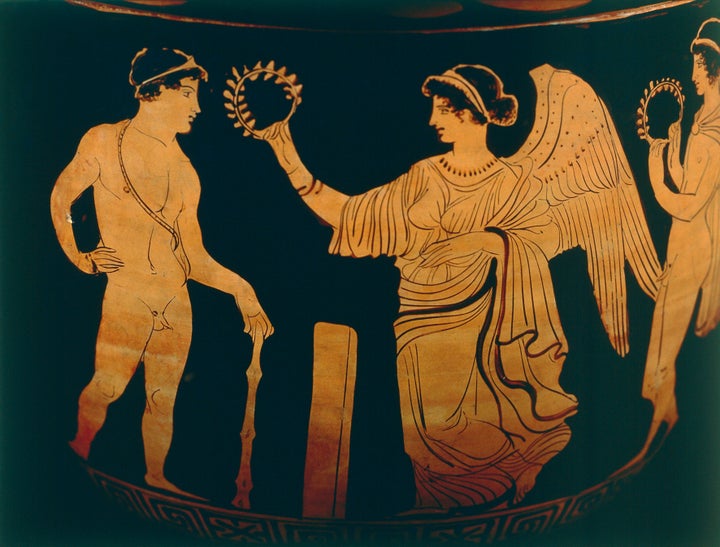 <strong>An athlete is crowned after winning an event at the ancient Olympics</strong>